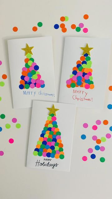 three christmas cards with confetti on them