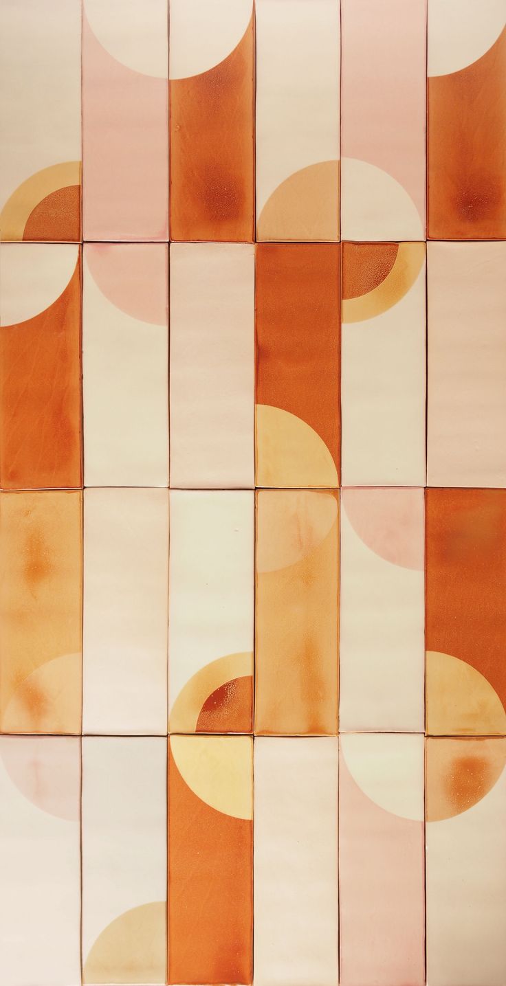 an orange and white tiled wall with circles on it