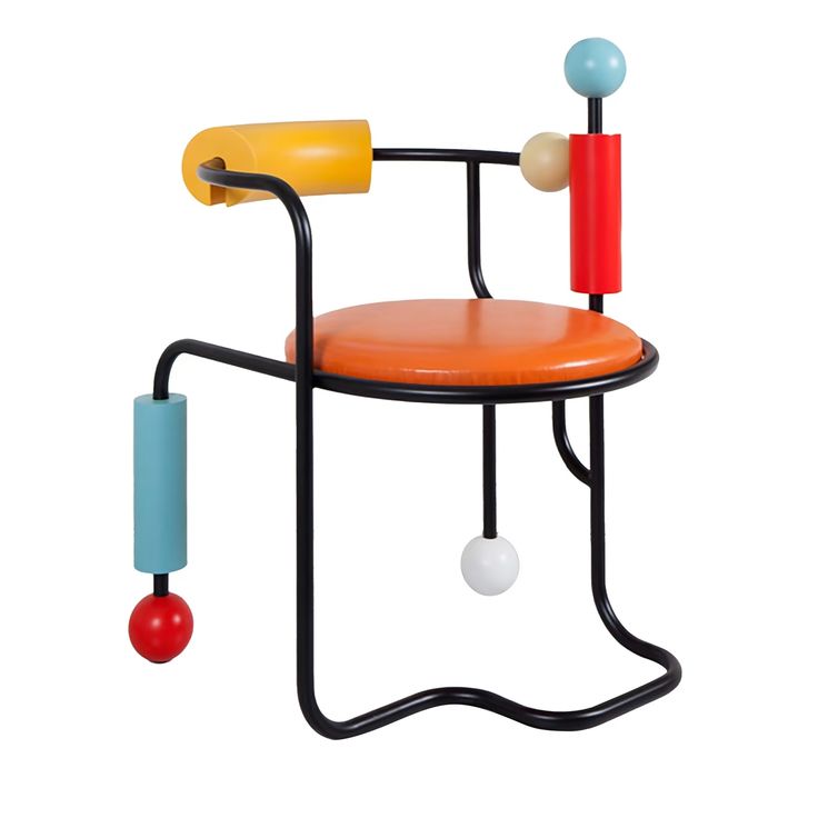 a chair with an orange seat and two colorful balls on the armrests that are attached to it