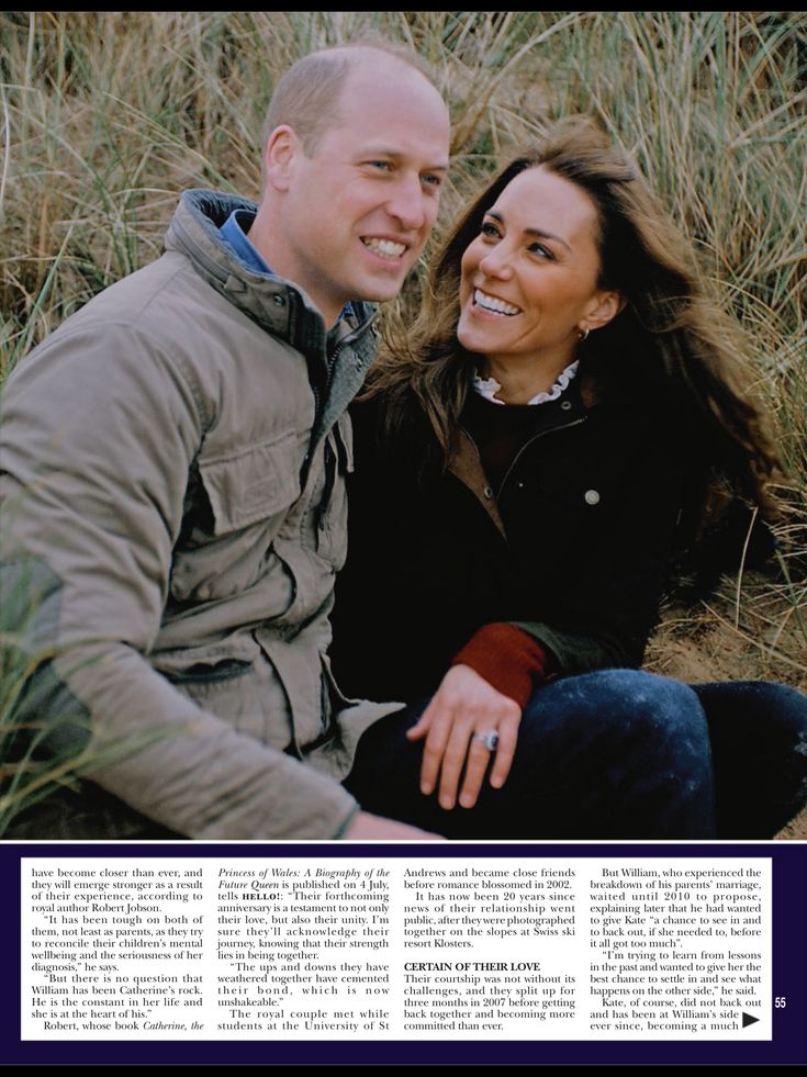 a man and woman sitting next to each other in tall grass