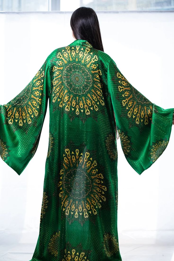 Enjoy+300 silk cover-ups and kimono robes with vibrant prints; Custom-made just for you. Screams Luxury and feel comfy wherever you go! ➡️ Shop Now! Luxury Purple Silk Kimono, Green Silk Floor-length Kaftan, Elegant Green Kaftan For Festivals, Elegant Green Festival Kaftan, Green Silk Kaftan With Kimono Sleeves, Gold Abaya For Festivals, Gold Long Abaya For Festivals, Green Traditional Kaftan With Kimono Sleeves, Traditional Green Kaftan With Kimono Sleeves