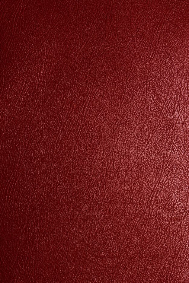 a red leather texture background or wallpaper