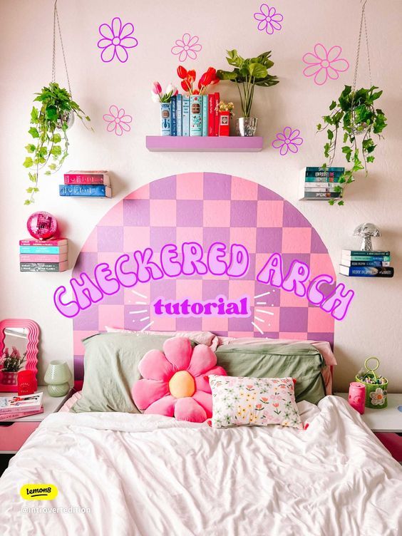 a bedroom decorated in pink and green with flowers on the headboard, bookshelves and shelves above the bed