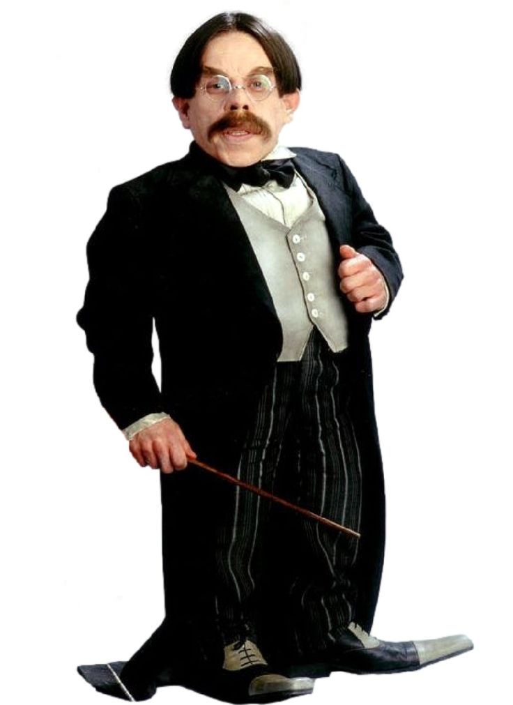 a man in a tuxedo and top hat holding a cane with both hands