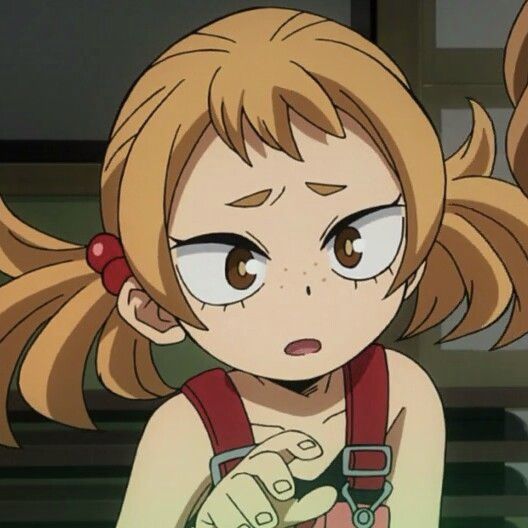 an anime character with blonde hair and big eyes holding a cell phone in her hand