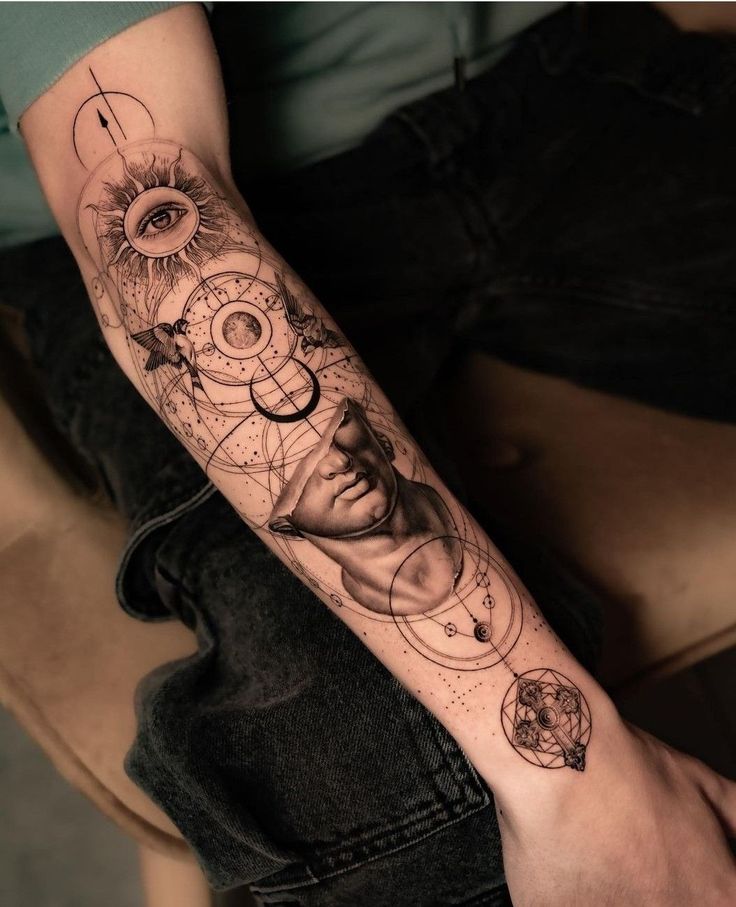 a man's arm with an abstract tattoo design on the left side of his arm