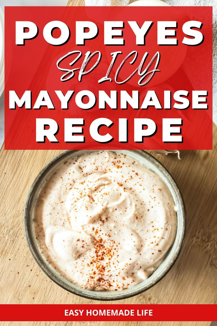 a bowl filled with mayonnaise on top of a wooden cutting board