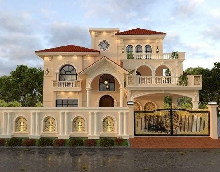 a large white house with a clock on the top of it's roof and balcony