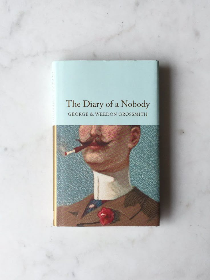 the diary of a nobody by george & vernon crensfield on a marble surface