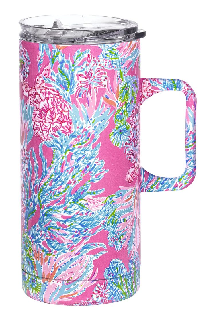 thermos travel mug in pink and blue with flowers on it, is shown