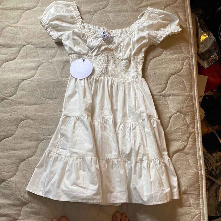 White Mini Dress Bought For Graduation But Am Using A Different Dress Babydoll Dress White, Aesthetic White Dress, Carpenter Outfits, Dollar Dress, Princess Polly Dress, Sabrina Carpenter Outfits, Wrap Dress Long Sleeve, Frilly Dresses, White Sundress