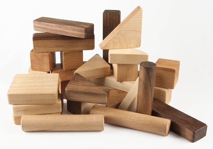 a pile of wooden blocks sitting on top of each other