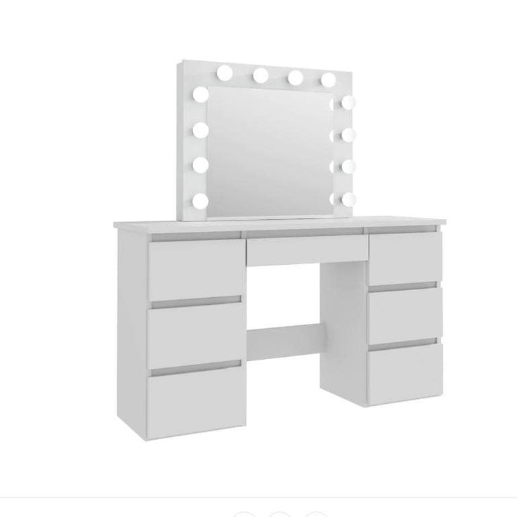 a white vanity with drawers and a mirror