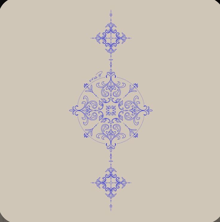 a blue and white ornamental design on a gray background