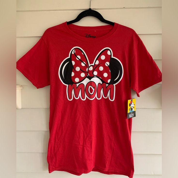 Disney Minnie Mouse Mom Red T-Shirt Nwt Size Small New With Tags 100% Cotton One Tag At Neck Looks Like It May Have Been Cut Out. Perfect T-Shirt For A Day At Disney World Or Disneyland Or Just Because You Love Mickey And Minnie Mouse. Approximate Flatley Measurements: Pit To Pit 17 1/2 Inches, Length 20 1/2 Inches . Red Character Print Top, Cute Red Cotton T-shirt, Red Short Sleeve Top With Minnie Mouse, Red Short Sleeve Top With Mickey Mouse, Fun Red Mickey Mouse Top, Cute Red Mickey Mouse Top, Cute Red Short Sleeve T-shirt, Red Disney Crew Neck Top, Red Crew Neck Top With Minnie Mouse Detail