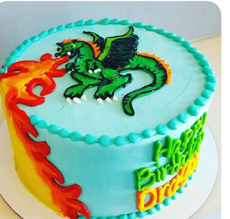 a birthday cake with a dragon on it