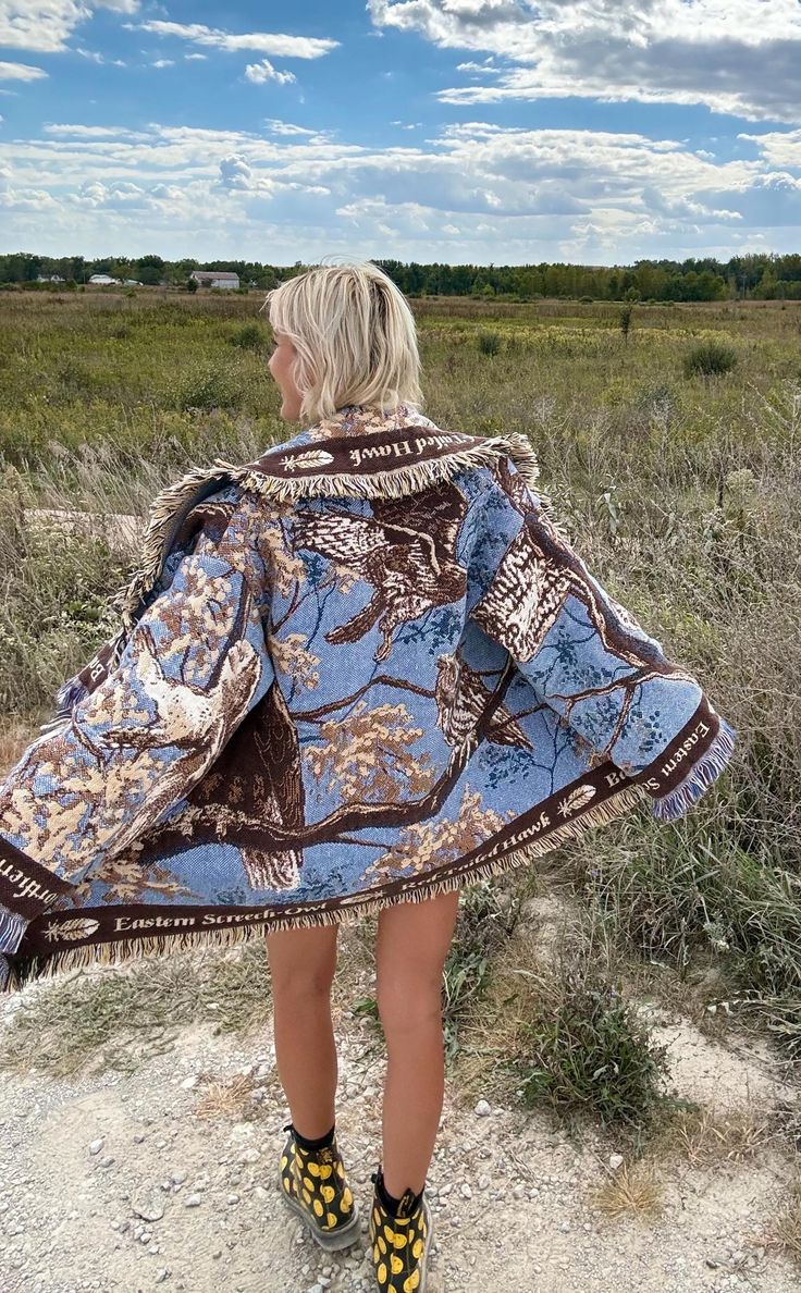 Introducing my latest creation! Upcycled a beautiful vintage raptor themed fringe blanket into this cozy, one of a kind blanket coat! Perfect statement piece for breezy seaside mornings, late nights at festivals, dinner dates, or lounging around the house. Sure to turn heads wherever you may wander! Measurements: Length: 34" Chest: 46" Shoulder to wrist: 22" Unisex design. Model is 5'10 for reference. 100% cotton. Durable, comfortable, sustainable. This statement jacket was made with all of my h Fringe Blanket, Blanket Jacket, Diy Jacket, Blanket Coat, Dinner Dates, Statement Jacket, Design Model, Unisex Design, Jackets & Coats