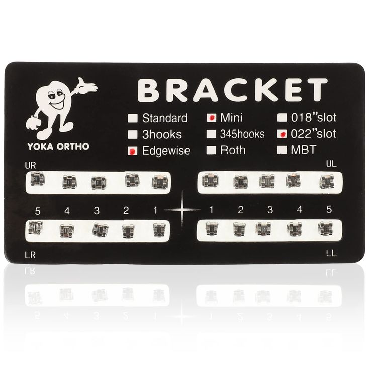 a black and white electronic device with instructions on the back side that says bracket