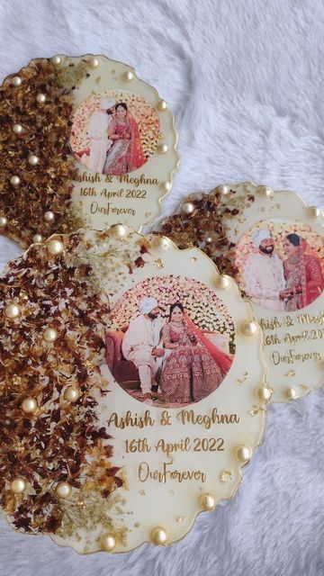 three personalized christmas ornament with gold and brown glitters on white furnishing