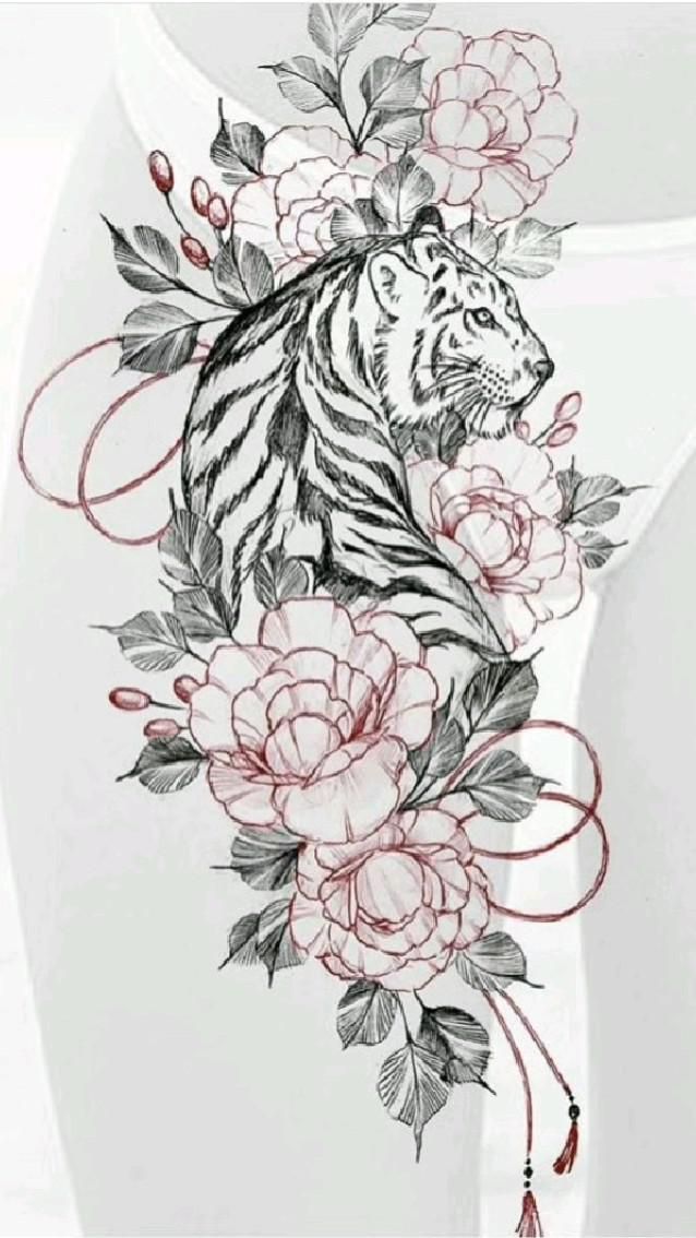 a tiger and flowers tattoo design on the back of a woman's bra top