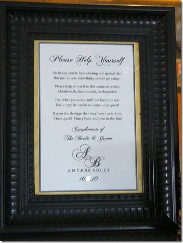 a black and gold frame with a poem in it on top of a countertop