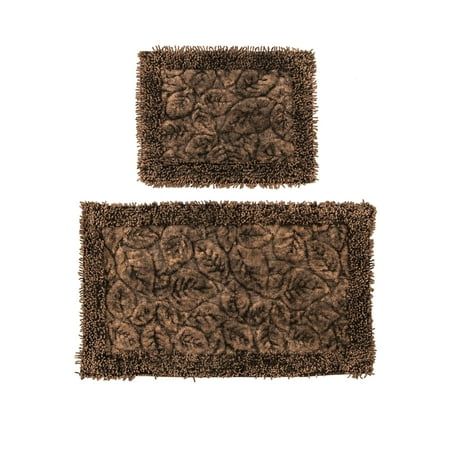 two brown rugs sitting next to each other