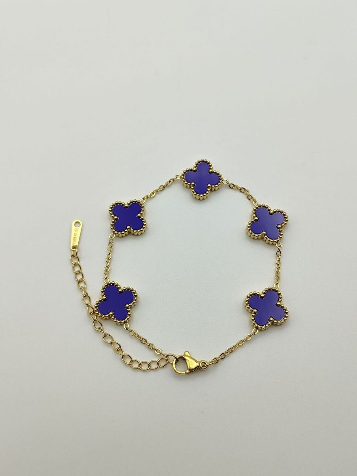 Material: Stainless Steel Fashion Element: Lily, Tulip, Flower, Petal Style: Classic style Trendy Blue Flower Shaped Jewelry, Trendy Blue Flower Bracelet, Elegant Blue Flower Bracelets, Luxury Blue Bracelet For Party, Ring Stacks, School Jewelry, Tulip Flower, Jewelry Fashion Trends, Flower Petal