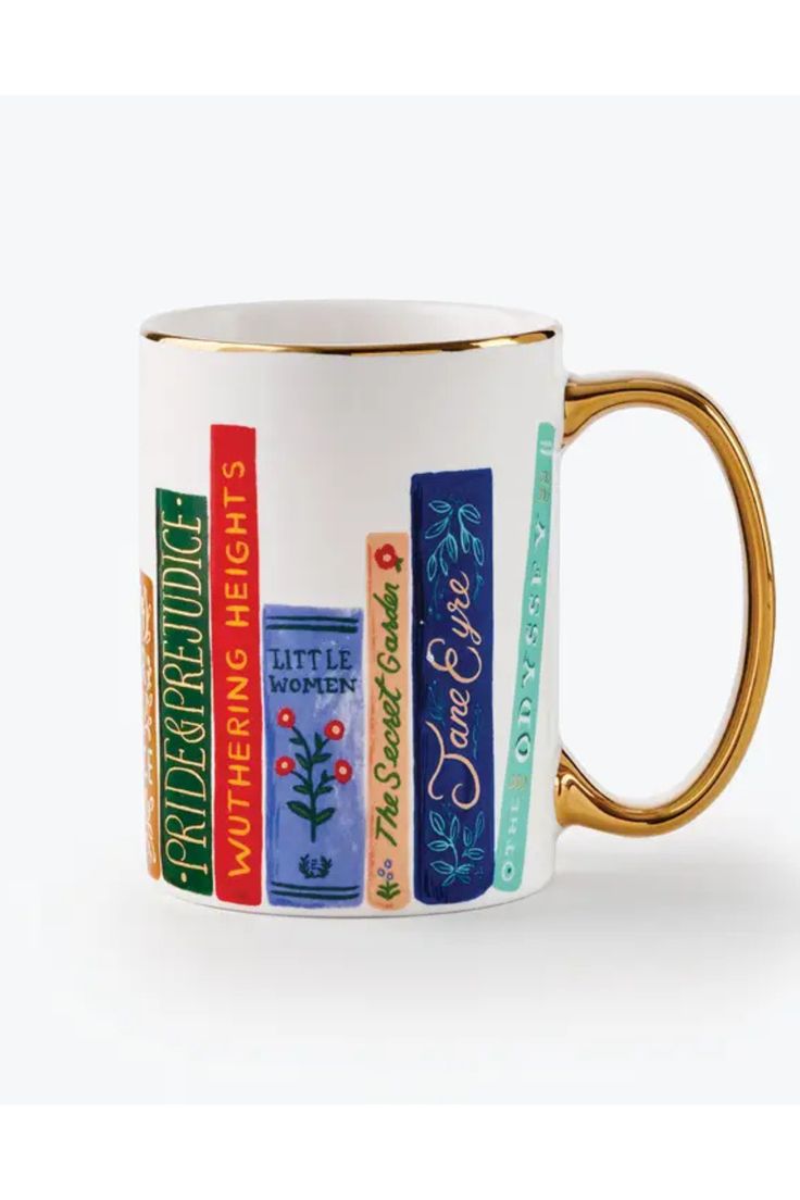 a white and gold coffee mug with books on the inside, in front of a white background