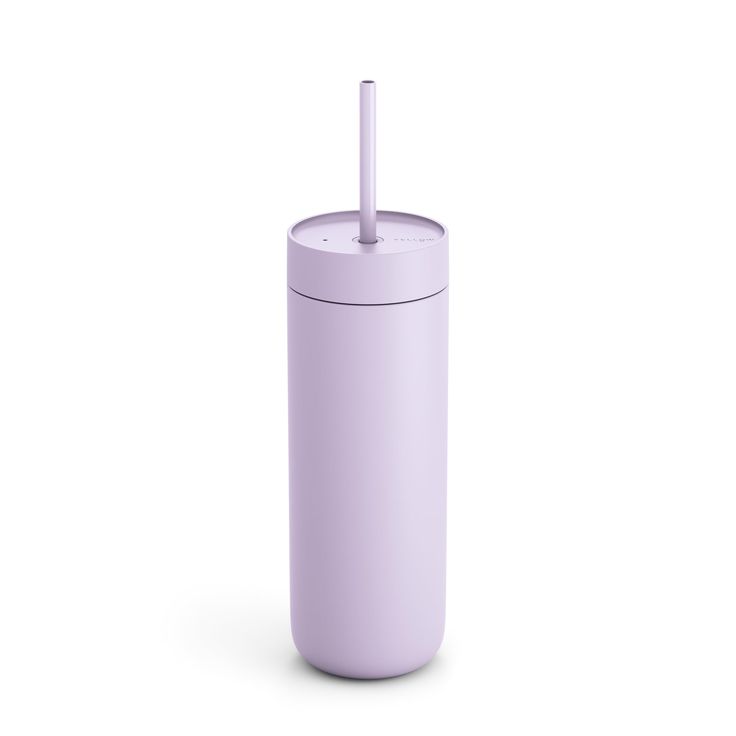 a purple tumbler with a straw sticking out of it's side on a white background