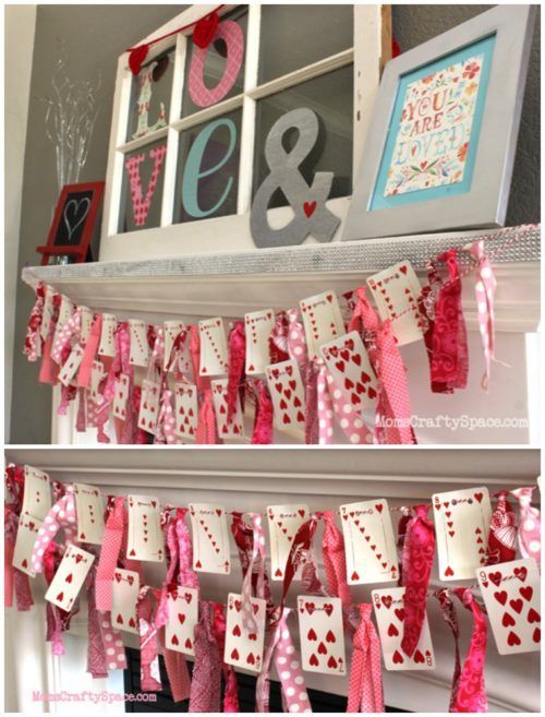 valentine's day decorations hanging on the mantle