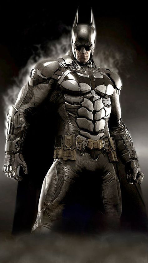 the dark knight batman is standing with his hands on his hips