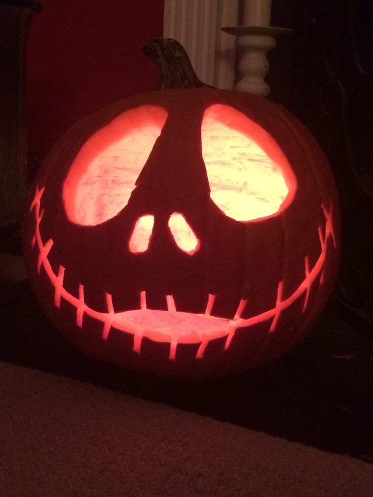 a pumpkin carved to look like jack o lantern