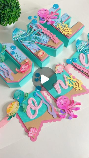 the video shows how to make mermaid themed birthday decorations