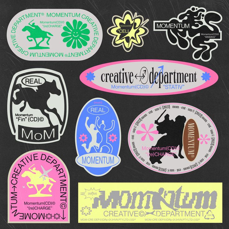 various stickers on the back of a blackboard with white and pink lettering that says creative department