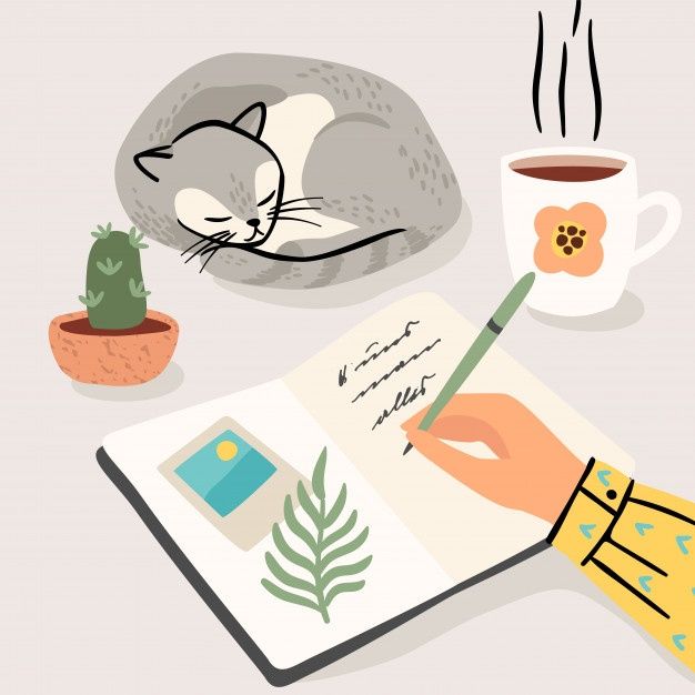 a cat sleeping on top of a book next to a cup of coffee and a pen