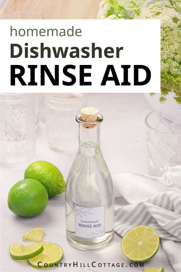 homemade dishwasher rinse aid recipe with limes on the table and in glass bottles