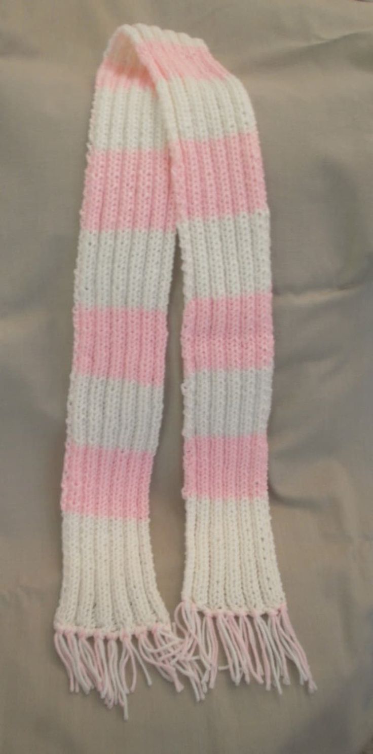 New - Handmade knitted scarf, Pink & White approximately 62 inches long (5 ft 2in), excluding the fringe, 4 1/2 inches wide Very soft, 100% acrylic Machine wash (delicates) and dry flat From a smoke and pet free environment Pink Crochet Scarf Pattern, Pink Knitted Scarves For Winter, Pink Knit Scarf, Pink Knitted Scarves, Winter Scarf Pink, 25th Bday, 2024 Halloween, White Scarves, Handmade Knit