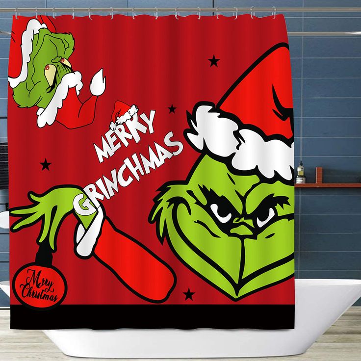 a shower curtain with the grin's face on it and merry grinmas written in red