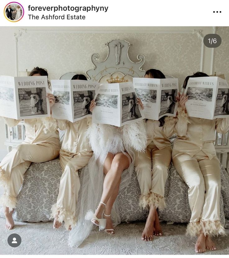 four people are sitting on a couch with newspapers in their hands and one person is reading the paper