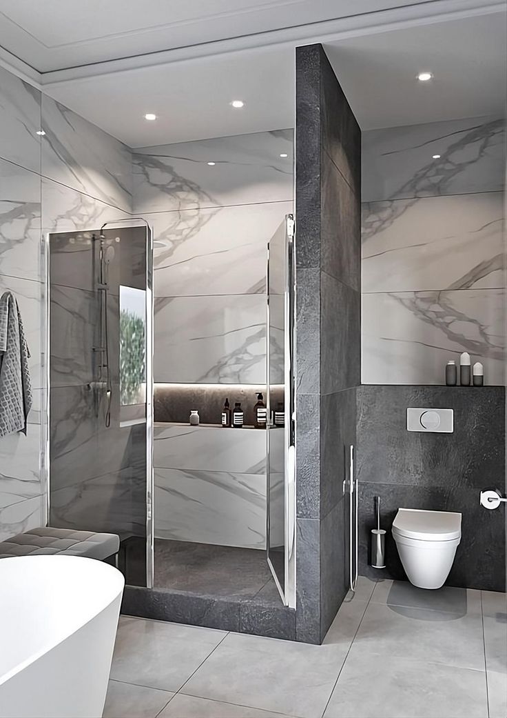 a modern bathroom with marble walls and floor