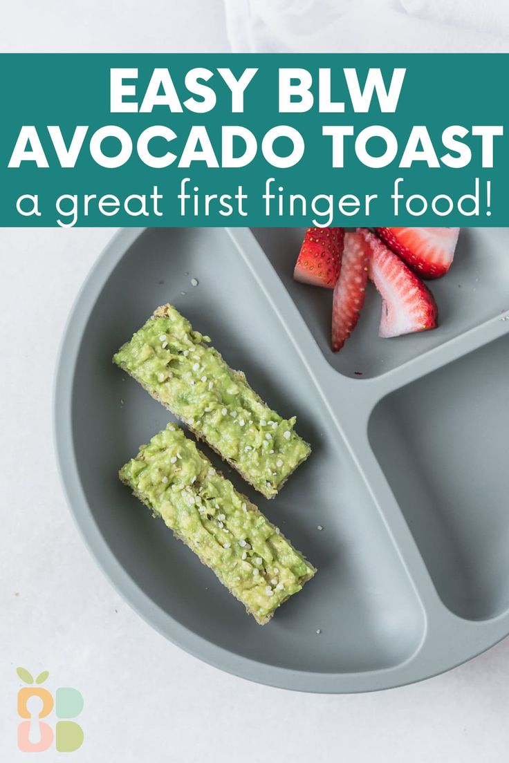 an avocado toast and strawberries on a plate with the words easy blw avocado toast