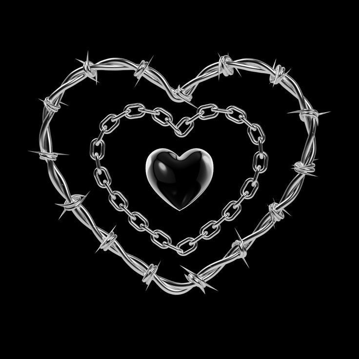 a heart made out of barbed wire with a black background