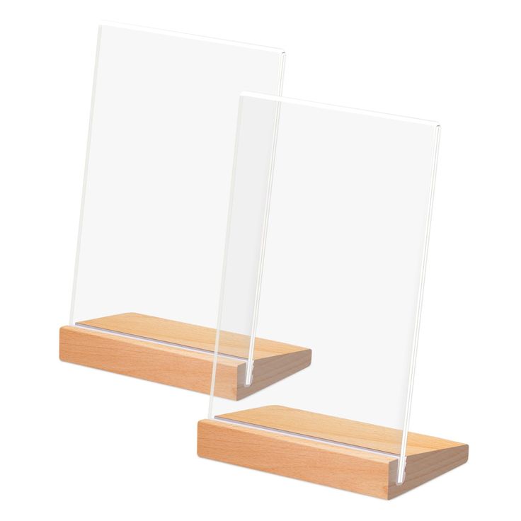 two clear acrylic displays on wooden bases