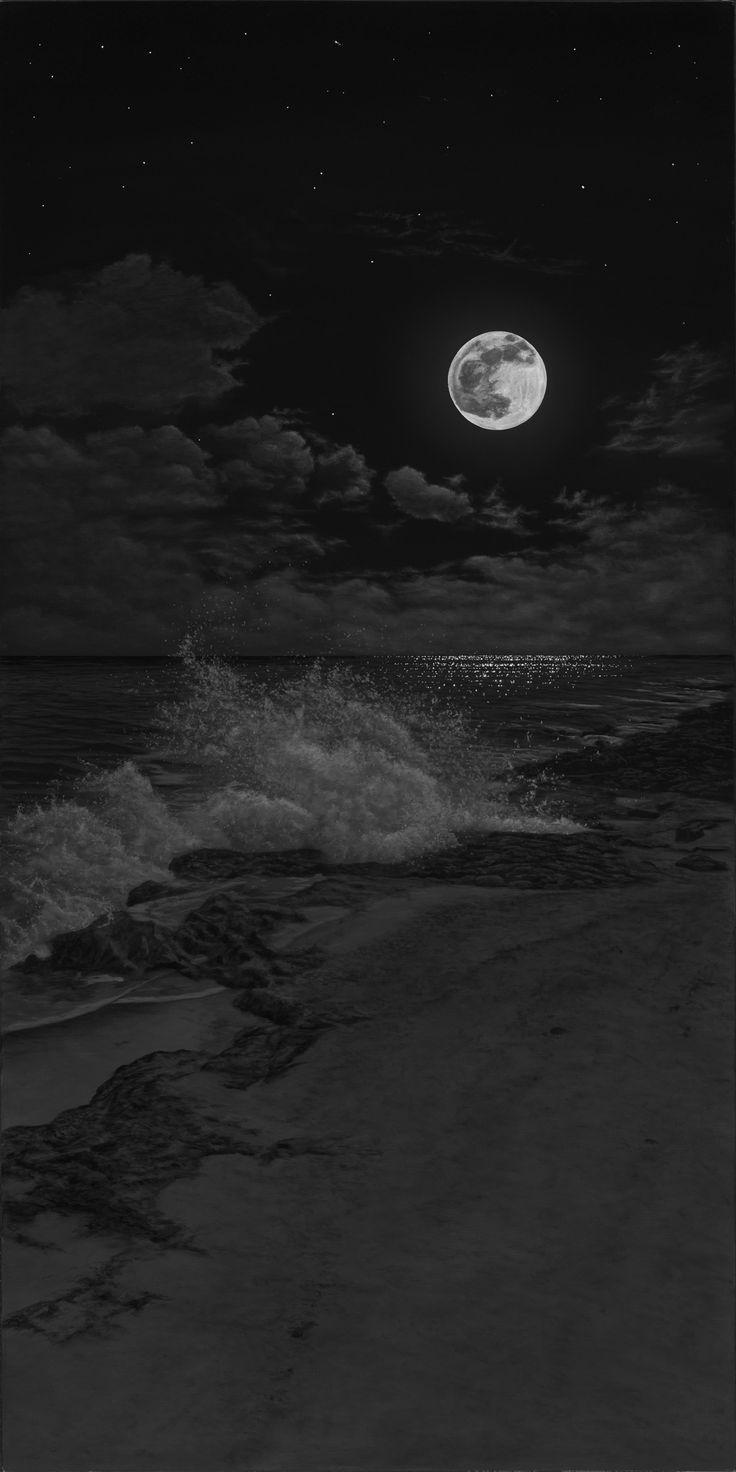 the moon is shining over the ocean with waves crashing in front of it and dark clouds