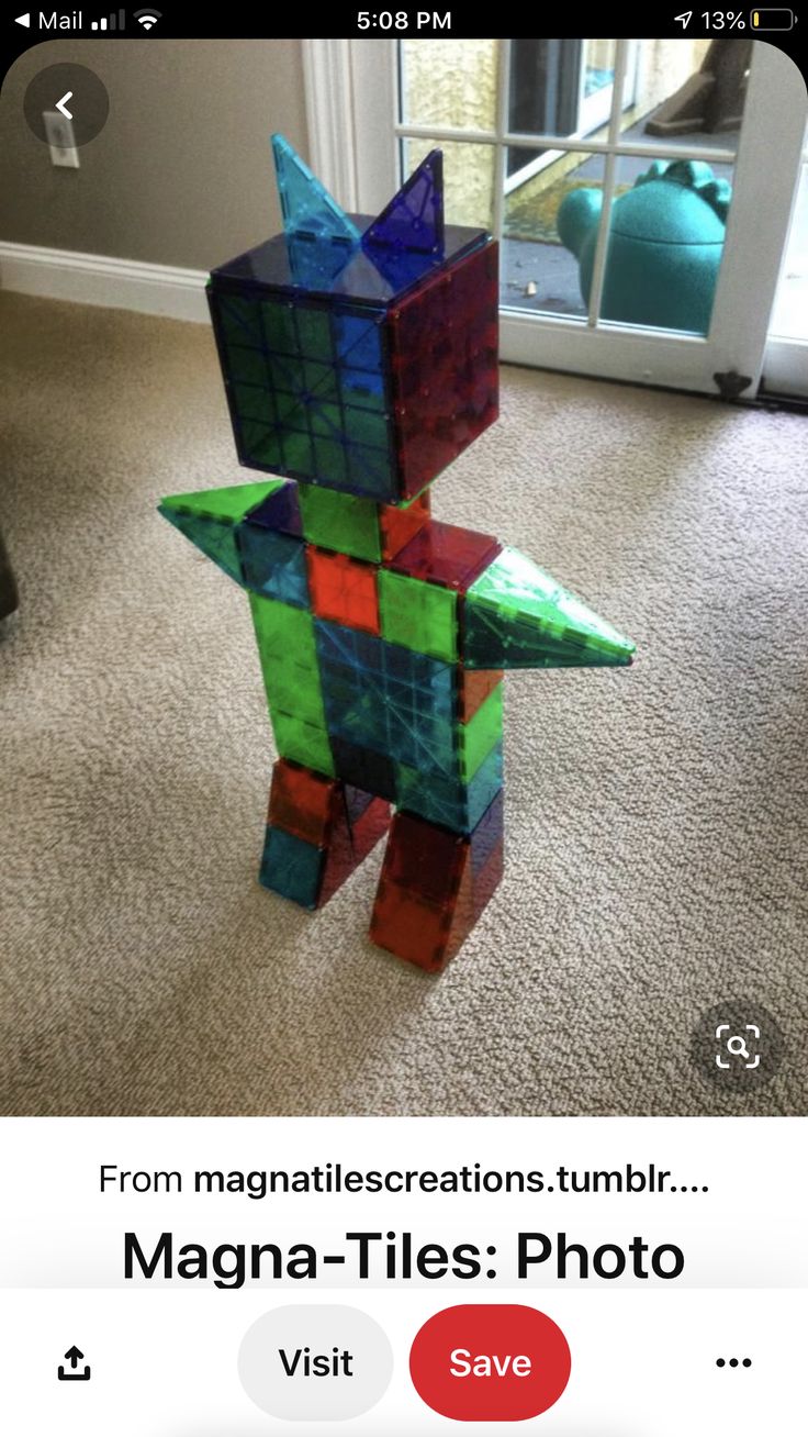 a toy made out of colored blocks sitting on the floor