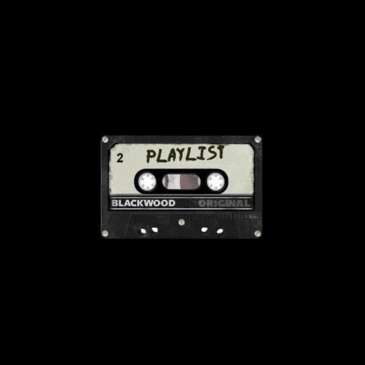 an old black and white cassette with the words playlist written on it's side