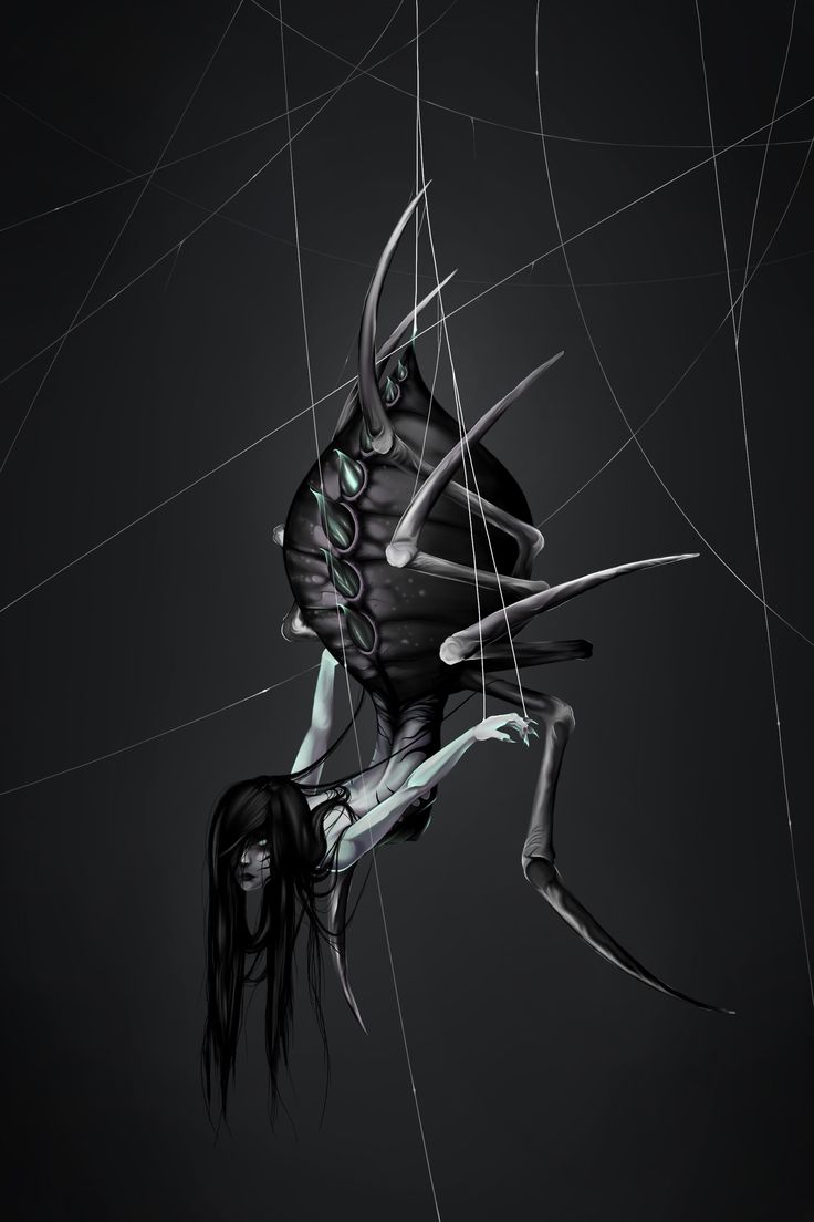 a woman in black and white is holding onto a spider with her hands on the web