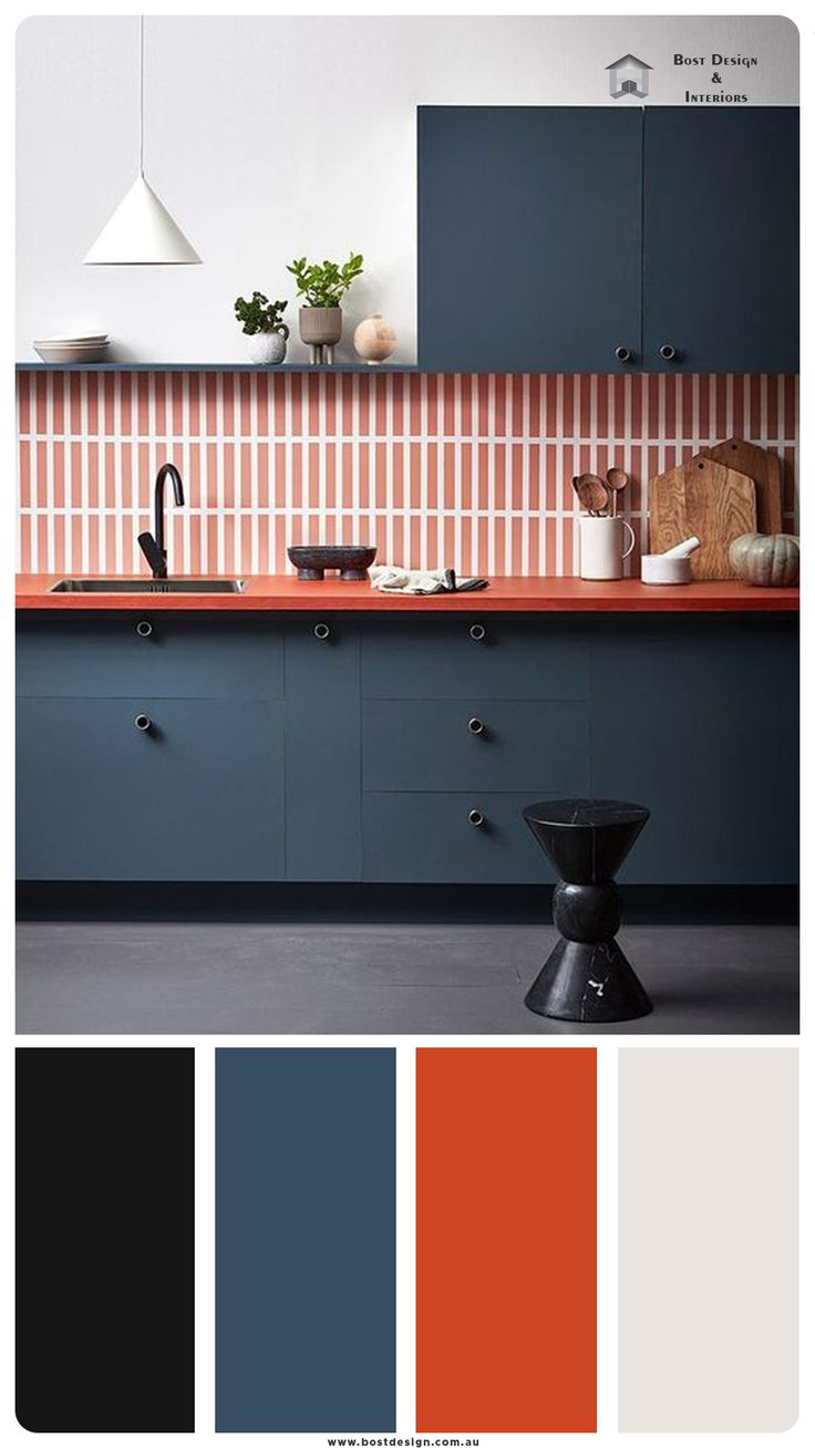 a kitchen with blue cabinets and orange counter tops