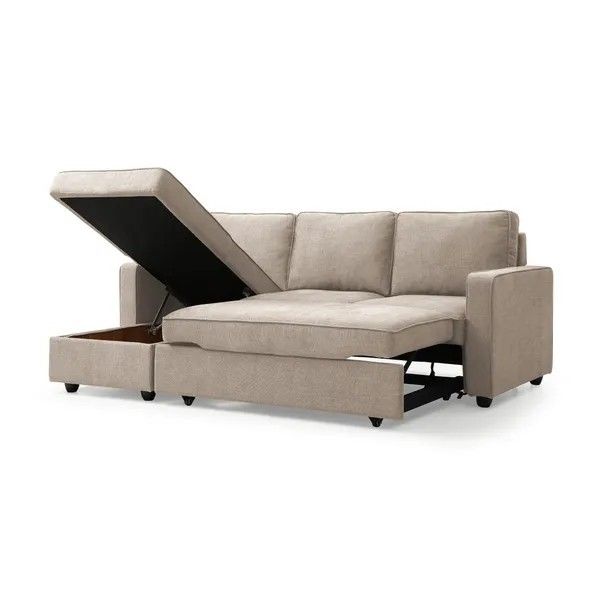 a couch with a pull out bed in the middle and an open drawer underneath it