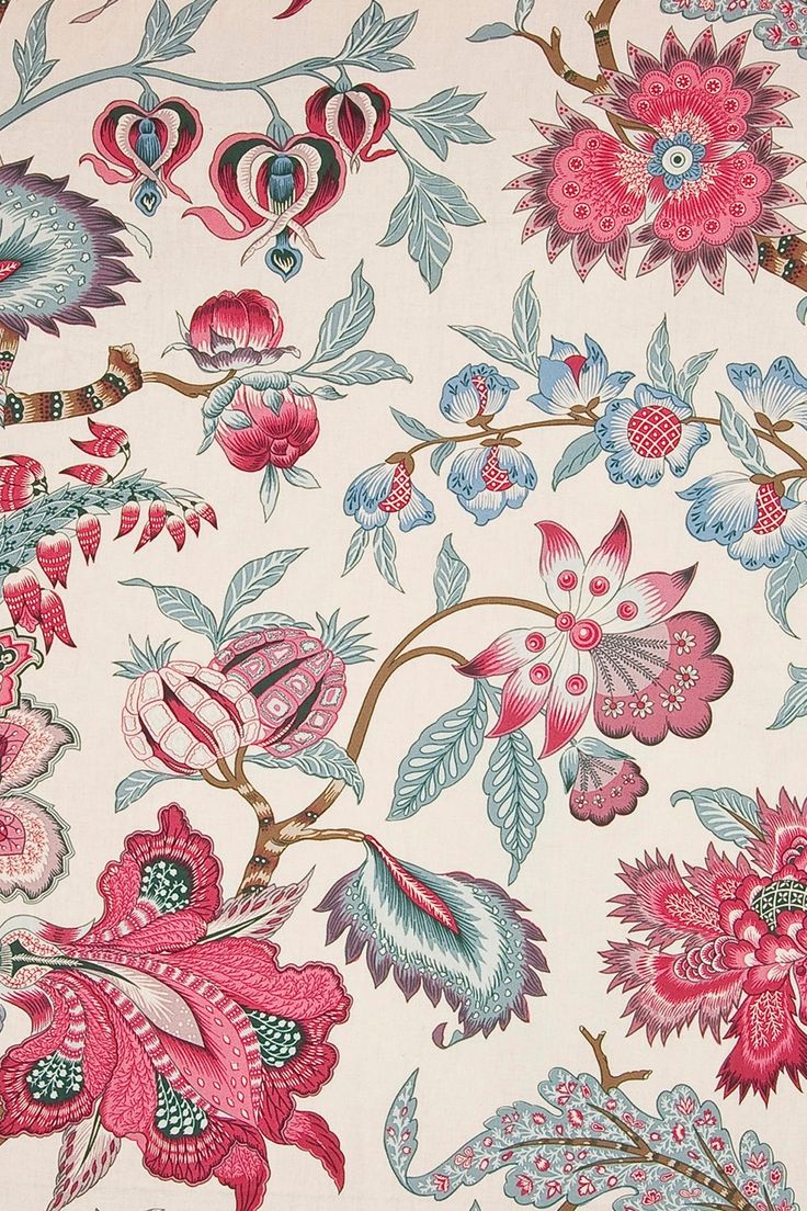 an image of a flowery fabric with pink and blue flowers on the back ground